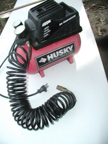 Husky Portable Electric Air Compressor    DK873700AV  3/08  *