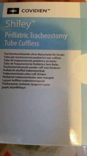 Shiley pediatric tracheostomy tube 4.0 with tube holders