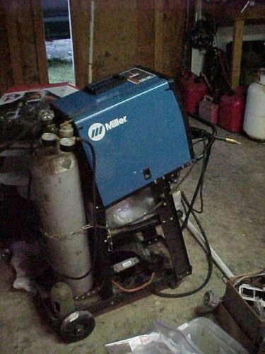 Miller, millermatic 130amp 220volt with tank, cart welding mask, .(nice) for sale