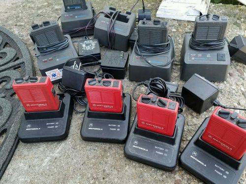Lot of 8 Motorola Minitor II pagers, 9 chargers. Untested