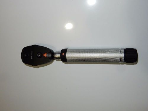 Heine Beta 200 handheld ophthalmoscope with self contained charger handle