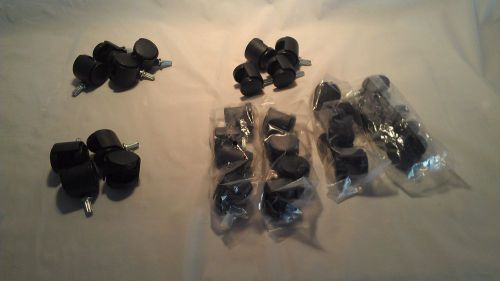 Lot of 28 black dual wheel swivel 1-1/2&#034; casters with 3/8&#034; grip ring stem for sale