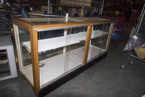 Wood &amp; glass display cabinet---84&#034; long on wheels, plexiglass on top for sale