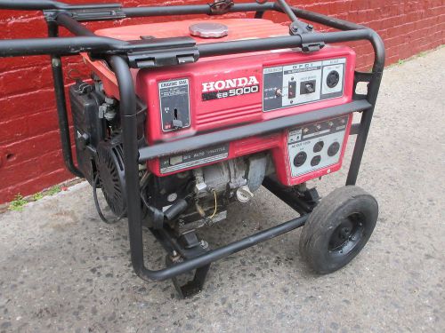 HONDA EB5000 generator 5000w / 110/220 /36 amp / quiet /wheel kit