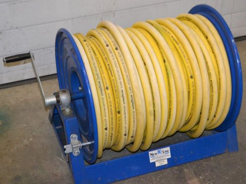 New surplus hose reel with 300&#039; hose for sale