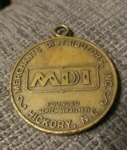 MDI Merchant Distributors, Inc. of Hickory NC 50 years key fob brass 31 to 81