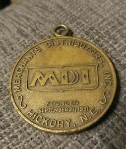 MDI Merchant Distributors, Inc. of Hickory NC 50 years key fob brass 31 to 81