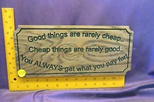 4304.&#034;Good things are rarely cheap, Cheap things are rarely good&#034; business sign.