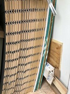 1 Lot 21 Slatwall panels 4x8 with bright aluminum slat. Charcoal gray laminate.