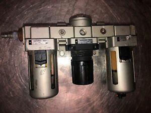 SMC PRESSURE REGULATOR NAR4000-N04. Left Filter Needs Replacement As Seen In Pic