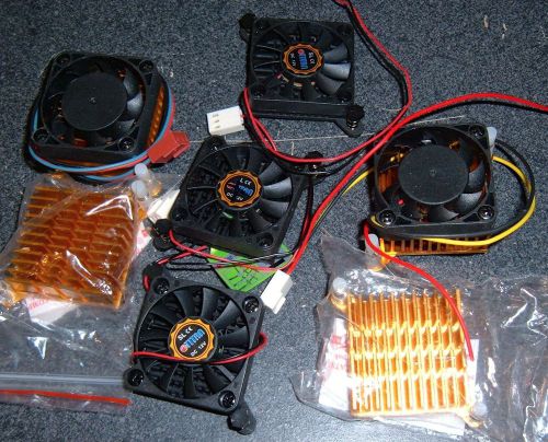 Lot of 7 40mm 59mm heatsinks, some with fans, extra fans, thermal compound for sale