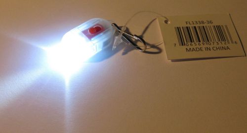 Mini super bright white led light with keychain and sliding switch with battery for sale