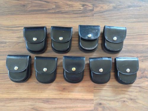 9 POLICE &#034;DON HUME C304&#034; HANDCUFF HOLSTERS-FITS UP TO 2 1/4&#034; BELT-USED. CHEAP