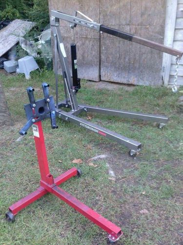 Automotive Parts that consist of engine hoists, engine stand, and car dolly set