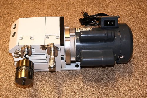 Leybold trivac d4b vacuum pump 91245-1  flow rate:4 w/ 1/3hp ge motor w/switch for sale