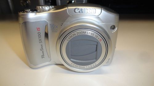 S18: Canon PowerShot SX100 IS 8.0 MP Digital Camera