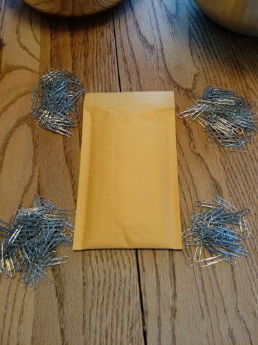 Small Paper Clips (Various). 6.5 oz package with approximately 400 pieces.