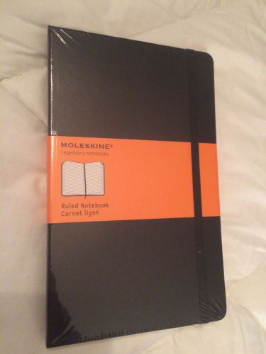 Moleskin ruled notebook.  In plastic.