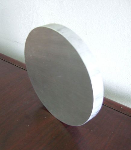 Solid disc of aluminum metal, 6 inches diameter x 3/4 inches thick, never used