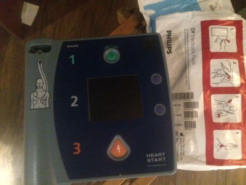 Philips HeartStart FR2 AED defibrillator (with new battery)