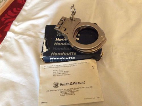 Smith and Wesson Hinged Model 300 Nickel Handcuffs, new in box paper dated 2/93