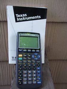 TEXAS INSTRUMENTS TI-83 GRAPHING CALCUATOR&amp; GUIDEBOOK