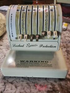 Paymaster Series x-550 The Paymaster Corp with keys and plastic cover