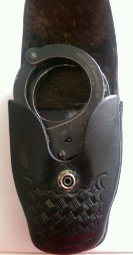 Used black peerless model 701b handcuffs w/ key +tex shoemaker #204 case...nice! for sale