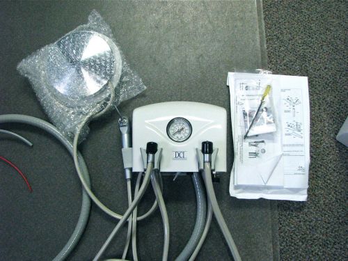 Dci iii wall / cabinet dental delivery unit 4502 2 handpiece &amp; precision syringe for sale