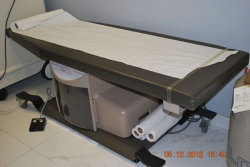 Ritter (Midmark) 306 medical exam table with caster base