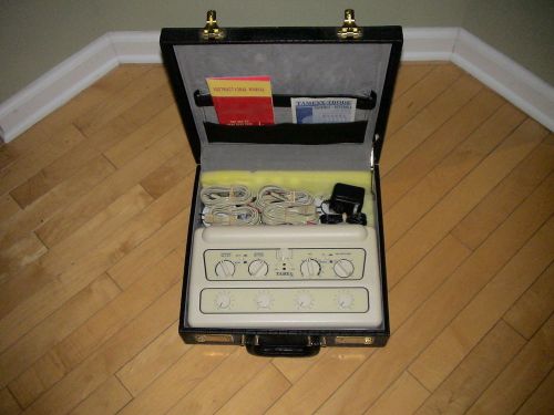 TAMEXX TMS-4000 Muscle Stimulator with AC Adapter, Case, Pads, and Instructions