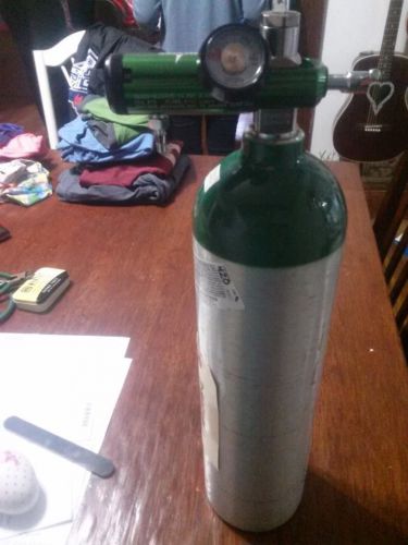 Oxygen tank, regulator, carry bag, and tubing for sale