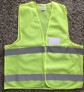 Neon yellow safety vest with reflective strips, velcro closure &amp; name tag for sale