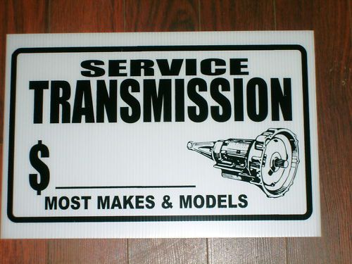 Auto repair shop sign: transmission service for sale