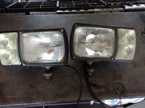 Set of Used AfterMarket Snow Plow Headlights  Top dominion