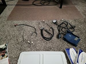2 stethoscopes Blood pressure cuff. Forceps. Scissors