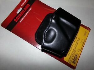 SAFARILAND LLC (CAGE 04TL0) HANDCUFF / MAG POUCH PADDLE 573-83-412 LEFT HAND