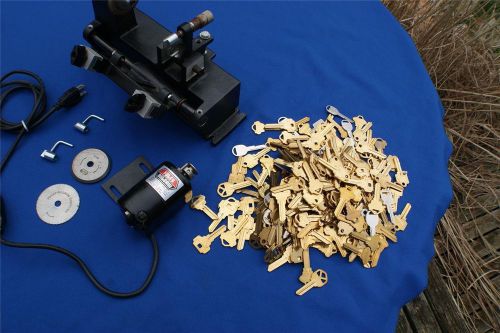 KEY CUTTING MAKING MACHINE FOLEY-BELSAW, extra blades and 6 pounds of key blanks