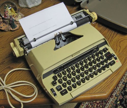 Sears &#034;Celebrity Power 12&#034; Electric Portable Typewriter, tan, w hard case
