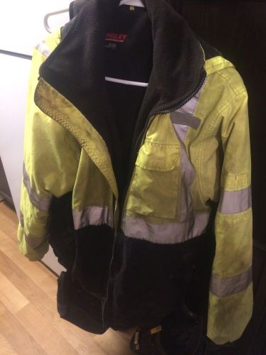 Used Yellow Large Construction Coat With Reflective Strips.