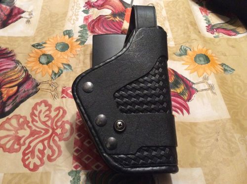 uncle Mikes Mirage duty Holster size 25 basket weave used but nice