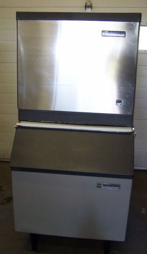 Nice used scotsman cme506as-1f  ice machine with 300 lb bin for sale