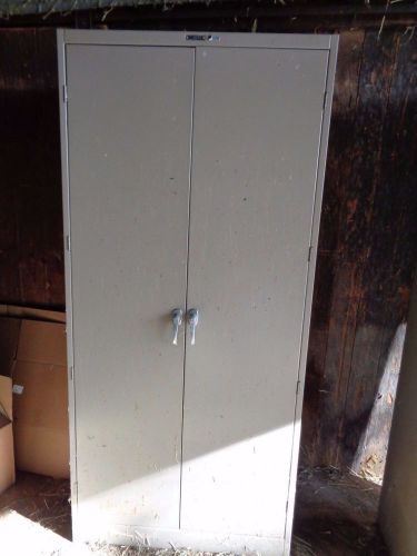 Metal storage cabinet 78 H x 36 W x 24 D, used (C-579)