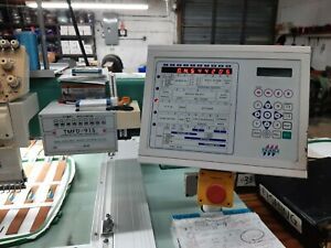 TAJIMA TMFD-915 15 HEAD, 9 NEEDLE, AUTOMATIC EMBROIDERY MACHINE