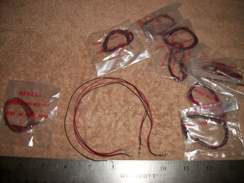 Lot of small clear 5-6v glass lite bulbs with leads! for sale