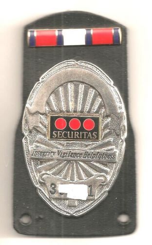 Securitas badge with Award Bar on leather backer