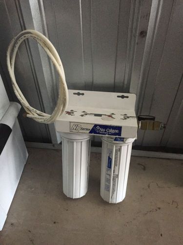 Nu-calgon dual water filtration system w/mounting bracket np series for sale