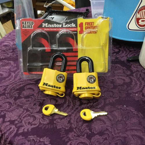 Master lock - 2 keyed alike padlocks - weather proof cover for sale