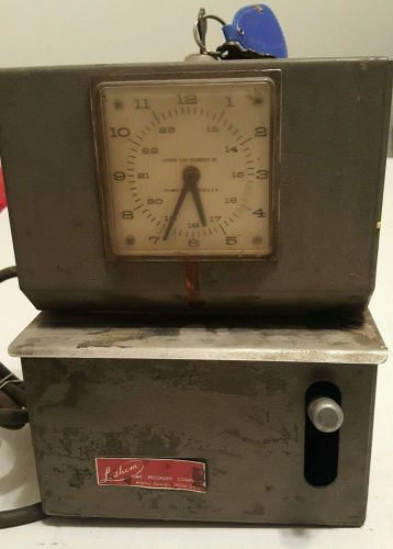 LATHEM TIME CLOCK   Employee Time Recorder  with key, missing plug on the cord.