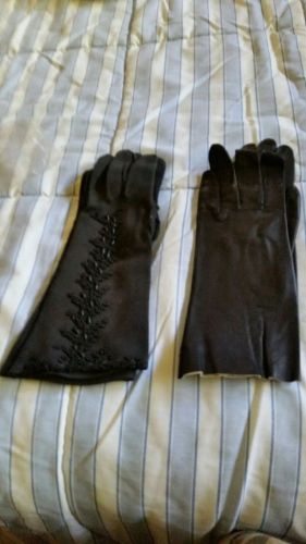 2 PAIRS OF BLACK GLOVES IN NICE SHAPE ONE IS COTTON AND ONE IS FAUX LEATHER